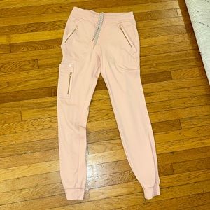 Jaanuu jogger scrub bottoms size XS mauve rose gold zipper